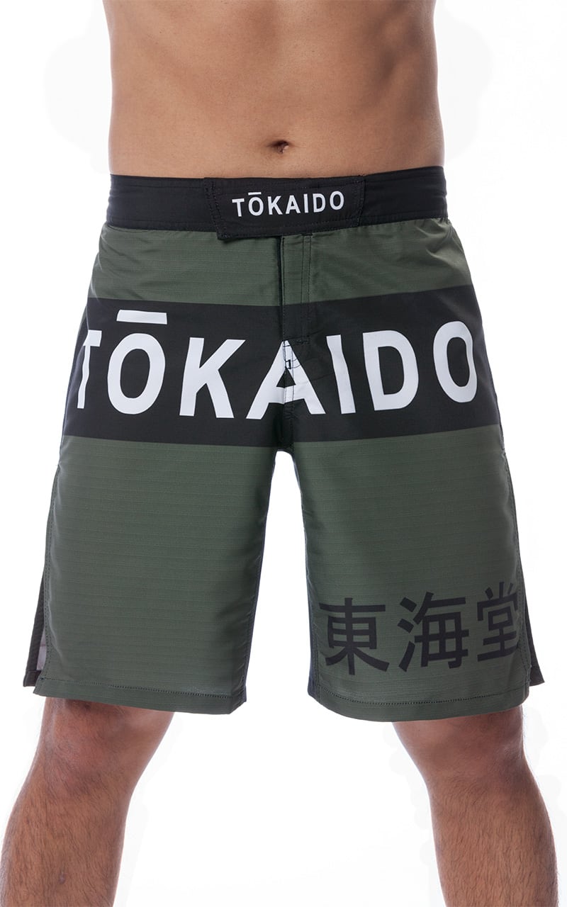 Pantaloncini da allenamento Tokaido.Colore verde con stampe sublimate