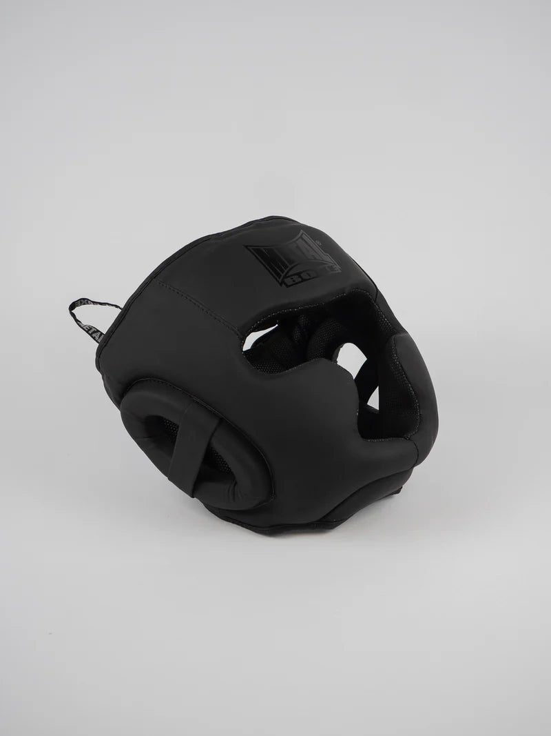 Vue de face du casque intégral Metal Boxing "Black Light" noir mat avec protections de pommettes et mentonnière intégrées