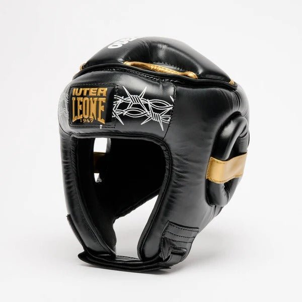 Casque de protection LEONE x IUTER Barbed Wire, noir et or, vue en perspective avec graphisme en fil de fer barbelé