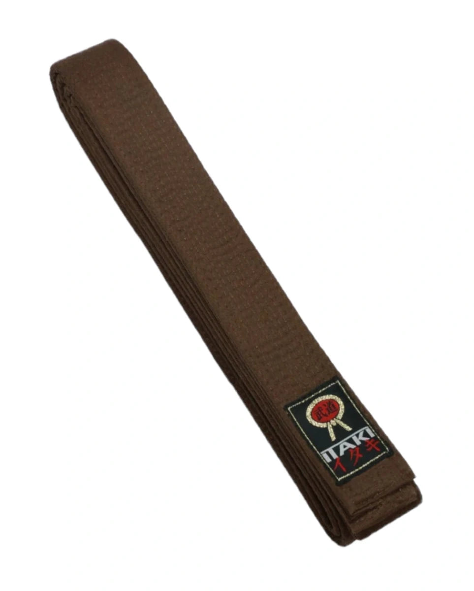 Zbliżenie na 12 ściegów podłużnych grubego brązowego bawełnianego paska Itaki Pro