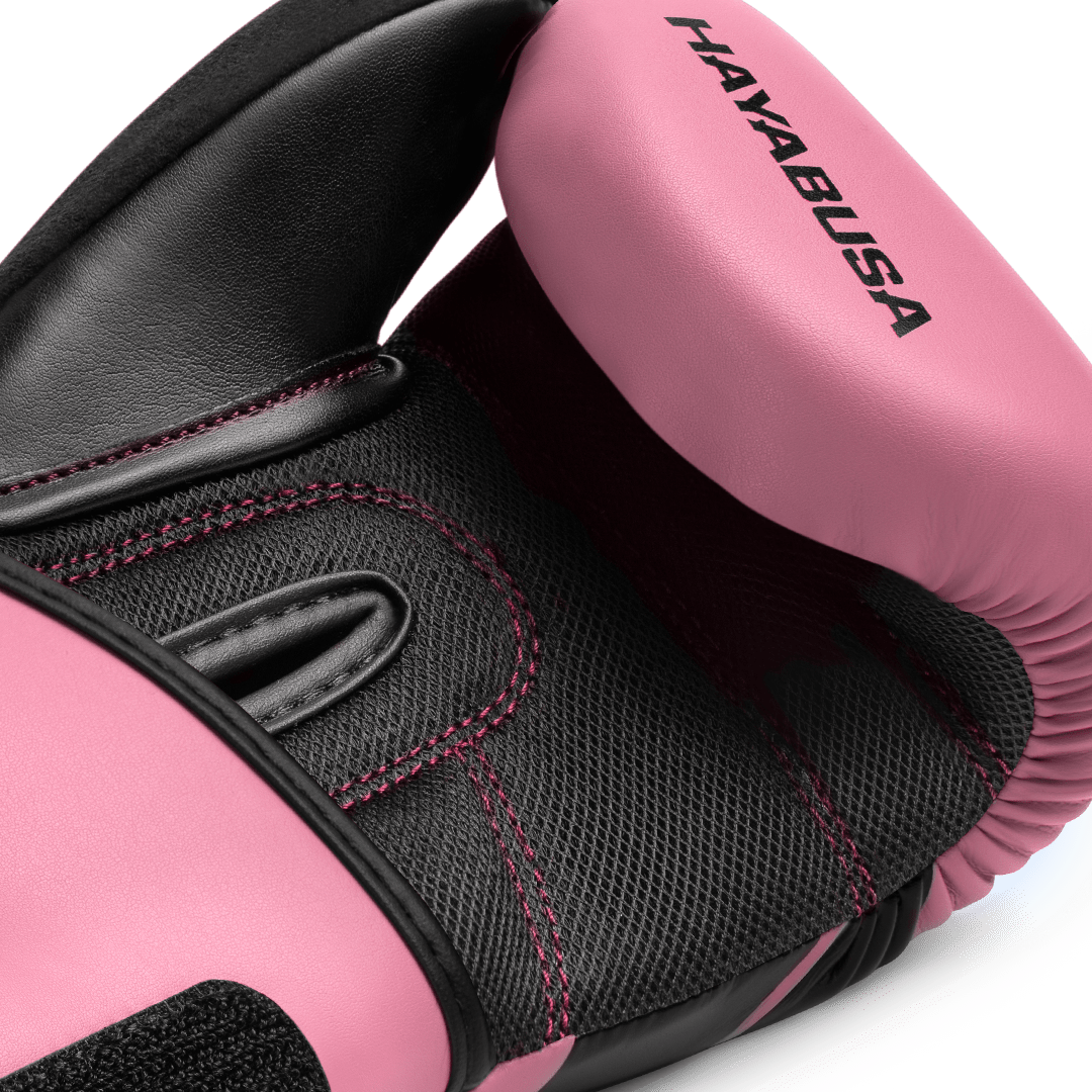 Teknisk detalj på den rosa Hayabusa S4-handsken för tjejer med ergonomisk tumme