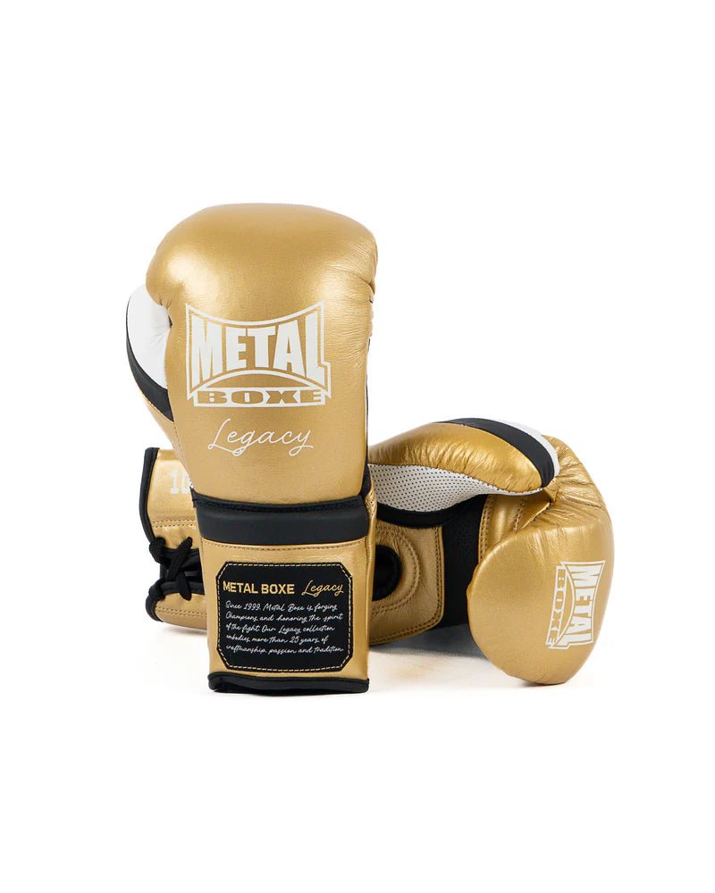 Ett par guld Metal Boxing Legacy tagelhandskar, elitstridsutgåva