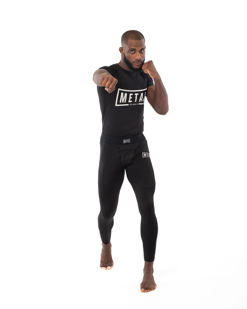 Front detail of men's black Metal Boxe leggings focus on elastic waistband