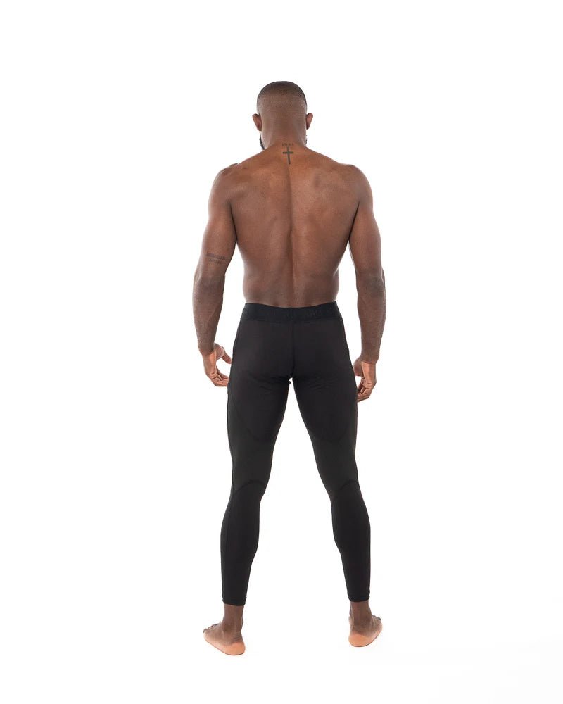 Rear view men's black Metal Boxing leggings, ergonomic fit and muscle support