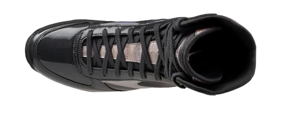 Material and stitching detail of the black Mizuno Wave Monster.