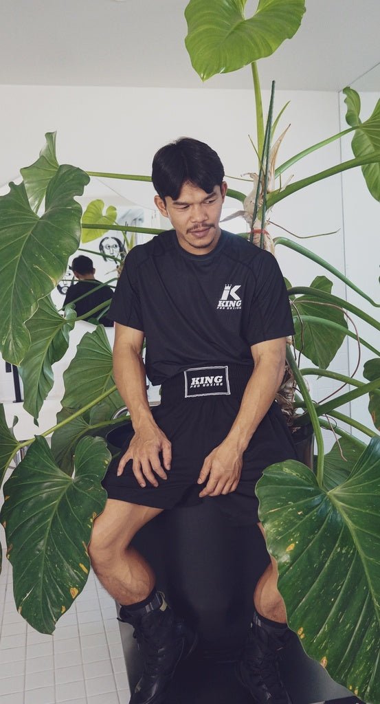 Athlete wearing black K King Apex Pro shorts