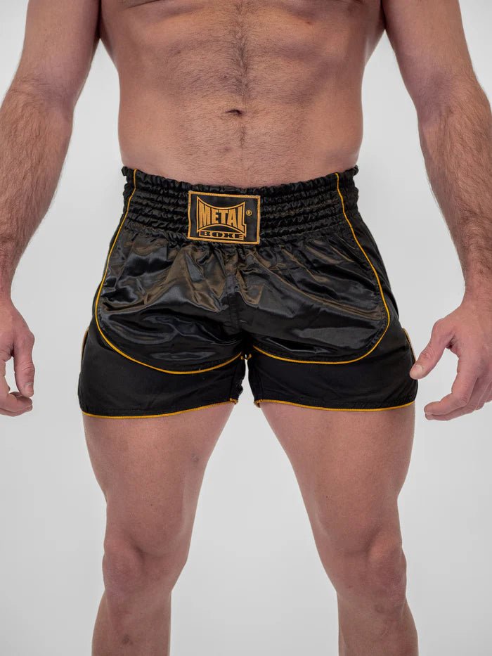 Vue de face Short de kickboxing homme Metal Boxing Siam noir or