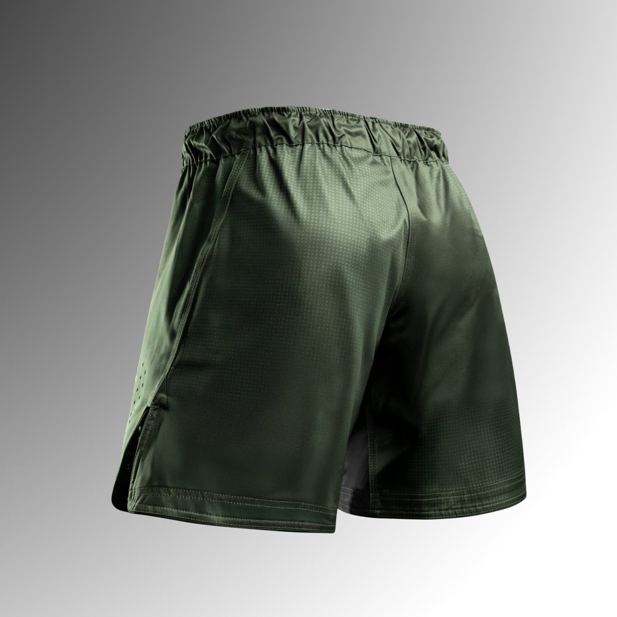 Rear view of the green Hayabusa Core Mid-Thigh MMA shorts in tear-resistant fabric for No-Gi