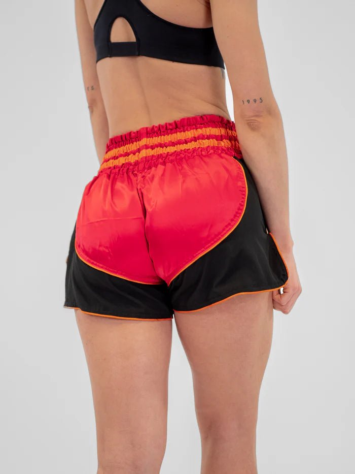 Rear view women's Kickboxing shorts Metal Boxing Lumpinee red elastic band