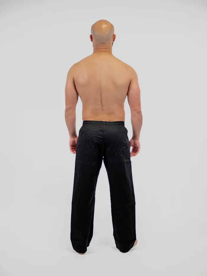 Vue arrière du pantalon de boxe Karate Metal noir coupe large traditionnelle