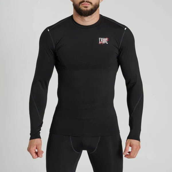 Vue de face du rashguard à manches longues noir Leone Primal Instinct