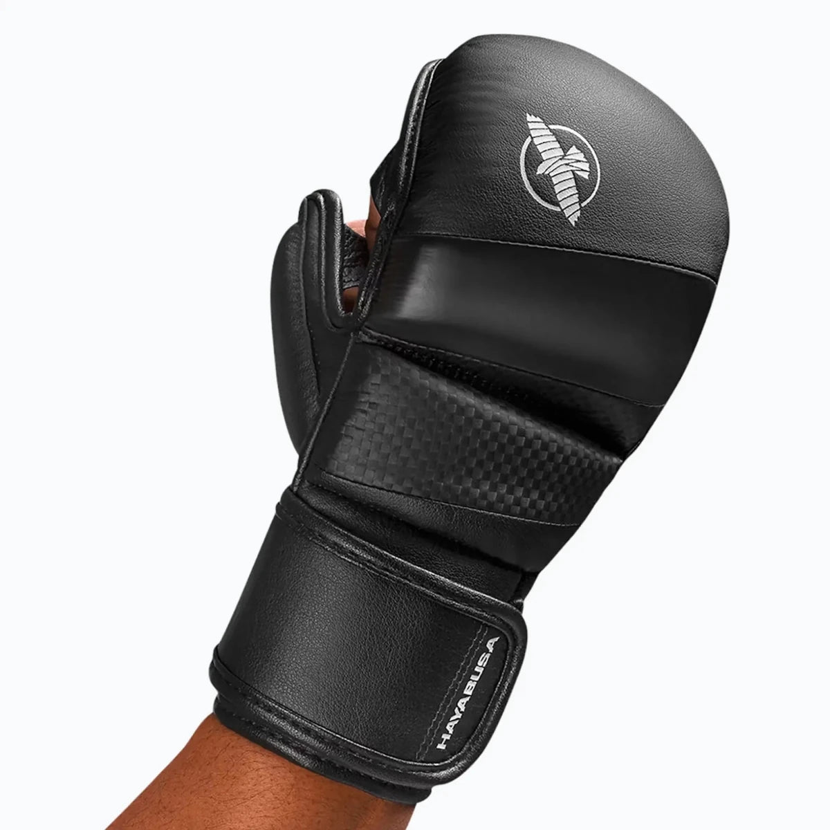 Detail of the multi-layer padding on the knuckles of the black Hayabusa T3 sparring gloves.