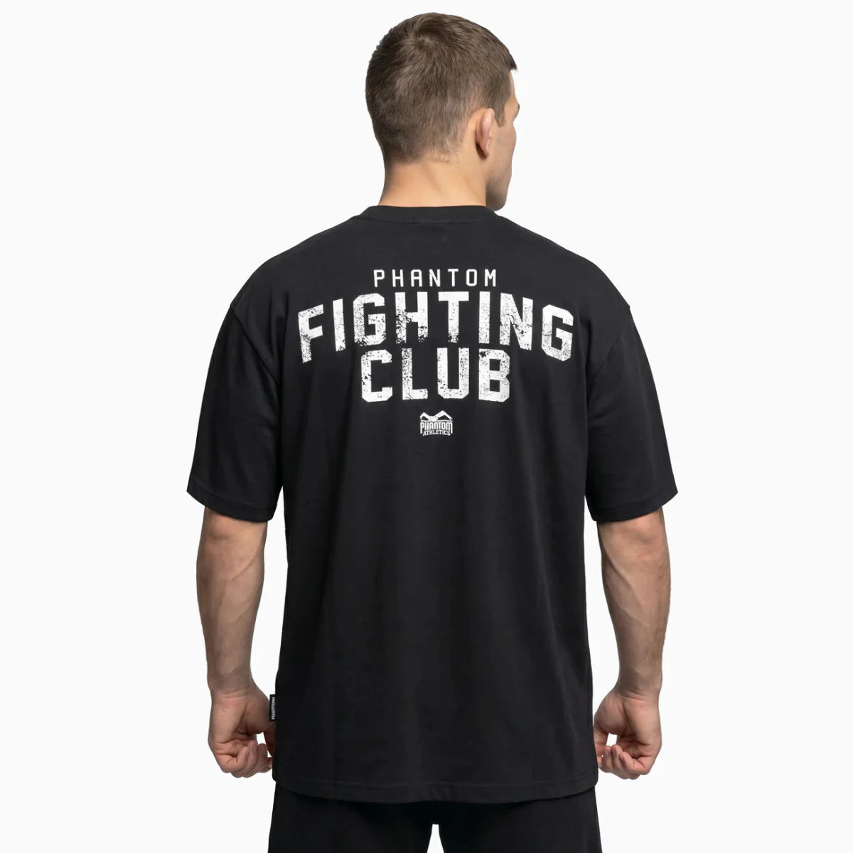 Bakifrån av den överdimensionerade svarta Phantom-t-shirten med den stora Fighting Club-grafiken på baksidan