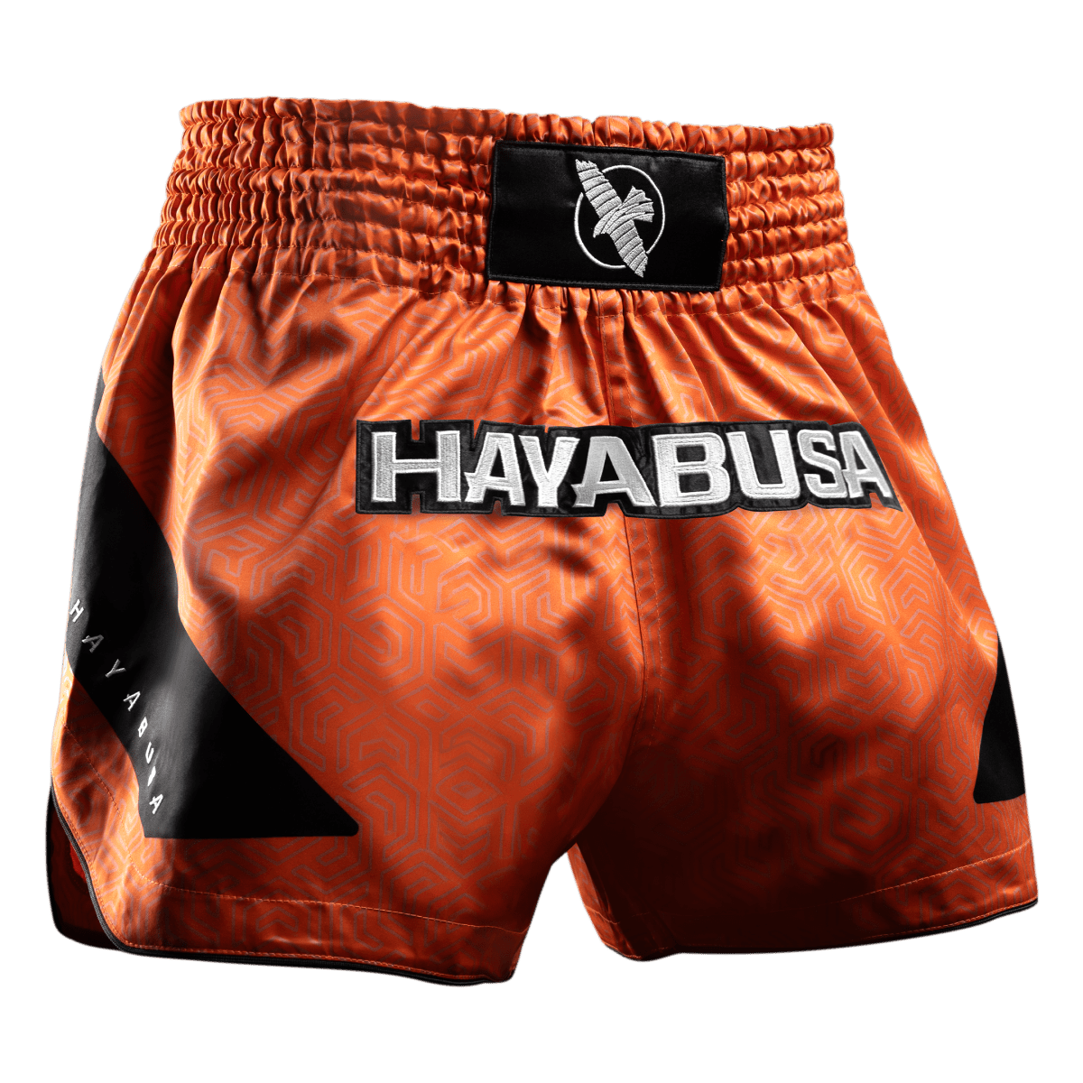 Orange Muay Thai Hayabusa Core shorts seen from the front in satin fabric