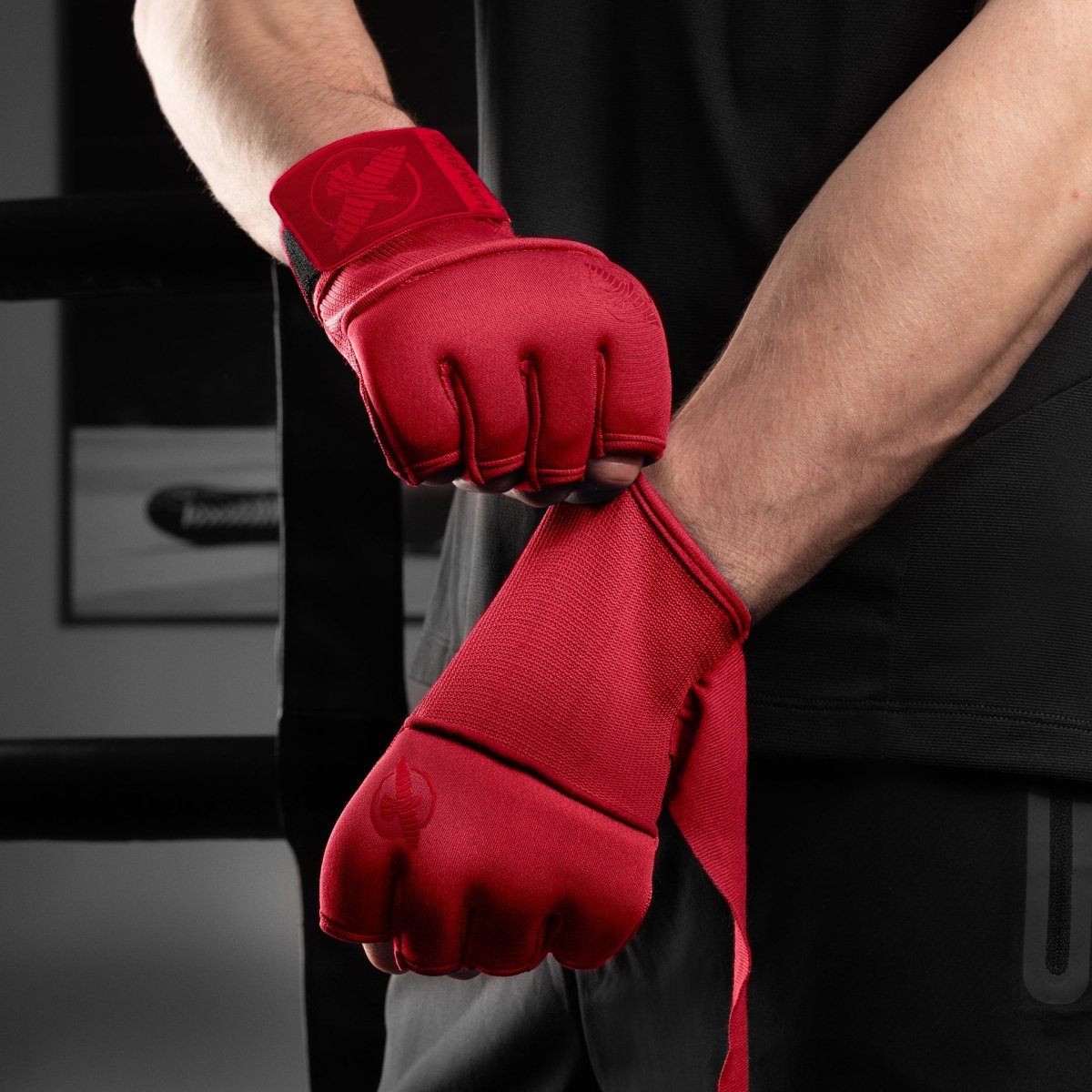 Hayabusa Deluxe red under-gloves worn, detail of the elastic band on the wrist